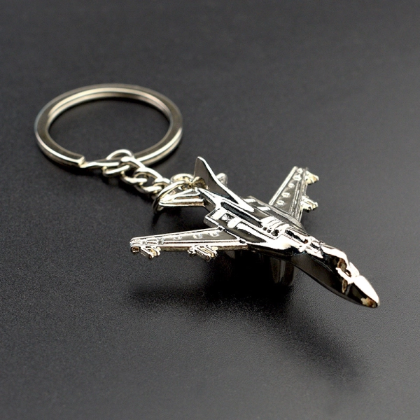 Llavero Metalico en forma de Avion, 4.4 x 5.6 cmts