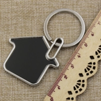Llavero Metalico Casa con marco plateado e interior negro, 69 x 43 mm